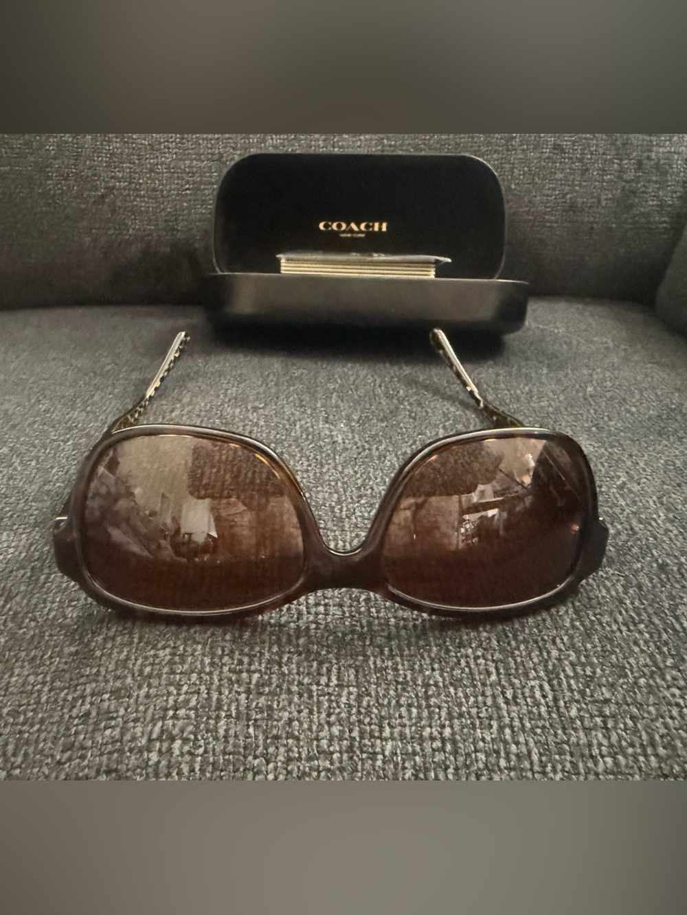 Coach brown sunglasses. Box, dust cloth and insert. Box scratched glasses new.